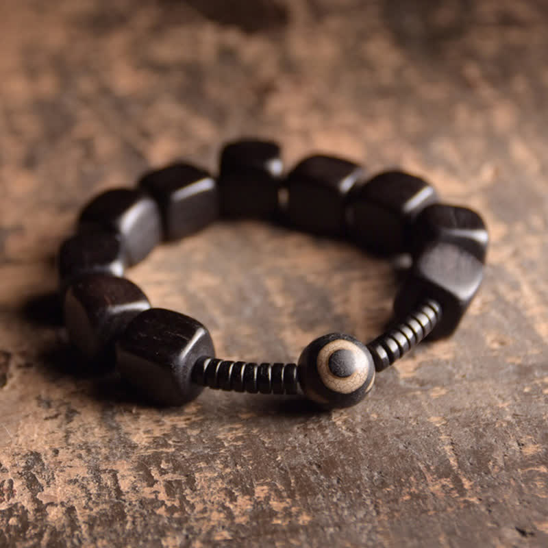 KarmaRipple's Tibetan Ebony Wood Dzi Bead Strength Bracelet p1