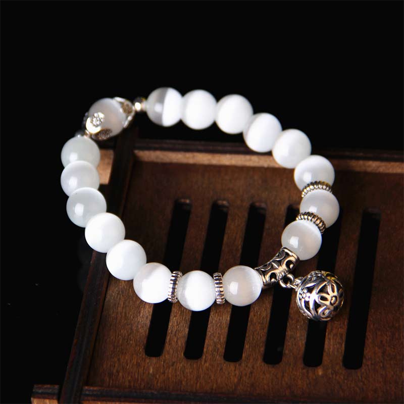 KarmaRipple's Tibetan Cat Eye Fortunate Bracelet p1