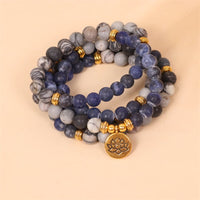 KarmaRipple's 108 Mala Beadwork Sodalite Zebra Jasper Gemstone Lotus Strength Bracelet