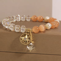 KarmaRipple's Orange Cat's Eye Ivory Gemstone Star Support Bracelet