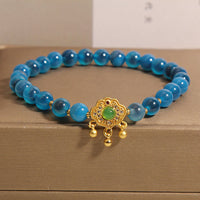KarmaRipple's Blue Candy Agate Chinese Lock Talisman Balancing Bracelet